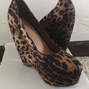 ALDO Leopard print wedge. Size 39. Gently used.